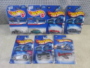 lot 244 image: (EC1) Assorted Hot Wheels in Packag...