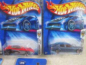 lot 245 image: (EC1) Assorted Hot Wheels in Packag...