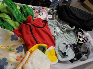 lot 97 image: Pet Clothes and Harnesses and Costu...