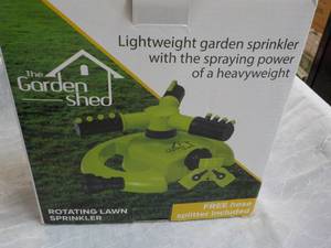 lot 290 image: The Garden Shed Rotating Lawn Sprin...