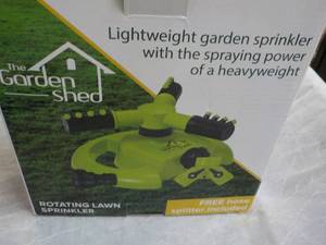 lot 291 image: The Garden Shed Rotating Lawn Sprin...