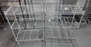 lot 31 image: Two 4ft  tall Wire Racks