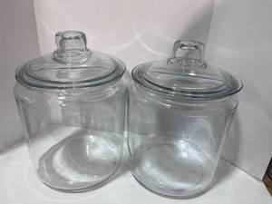 lot 66 image: Two Glass Canisters No chips or cracks 8 tall 7 Round