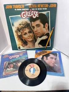 lot 81 image: Original Grease Soundtrack Album and 45s Grease, Youre the One That I want, and Greased Lightning