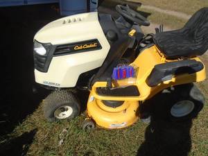 lot 101 image: Cub Cadet LXT 1042KW mower. Kawasaki motor. 42 deck with bagger system. Used condition. Runs good. Tested & works. As shown. THIS ITEM HAS A RESERVE.