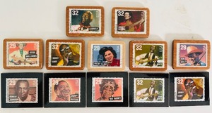 lot 245C image: BD - Collection of 11 Musician-Themed Postage Stamp Wood Magnets and Plaques