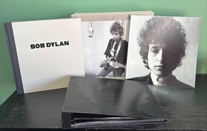 lot 82R image: AT - Bob Dylan Hardcover Book, Softcover Book, and CD Collector Book Box Set