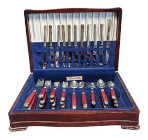 lot 124R image: AT - Vintage Flatware Set with Laslo for Mikasa Red Handled Utensils with Silver Plated Knives