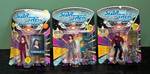 lot 127R image: AT - Set of 3 Star Trek The Next Generation Action Figures - Deanna Troi and Commander Riker