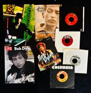 lot 329H image: BD - Bob Dylan Collection with Magazines, Book, and Vintage Columbia 45s