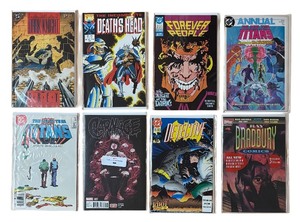 lot 200P image: CB - Collection of 8 Assorted Comic Books Including Teen Titans, Dark Knight and More