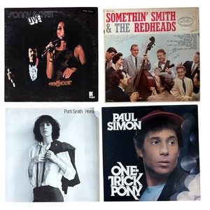 lot 229P image: RB - Collection of 8 Vinyl Record Albums Including Paul Simon, Cher, Saturday Night Fever and More