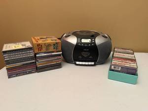 lot 80 image: Akai Boom Box Radio Cassette Player, Tapes and CDs.