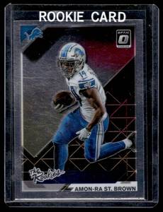 lot 312 image: Amon-Ra St. Brown   2021 Donruss Optic The Rookies #TR-17 Detroit Lions Football Card