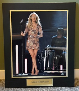 lot 10A image: Carrie Underwood Signed Photo With COA 19x16 Photo Matted