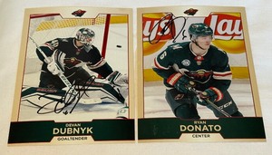 lot 73B image: Devan Dubnyk and Ryan Donato Signed Minnesota Wild Hockey Cards