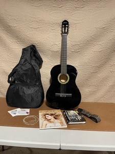 lot 148 image: Sequoia Classical Guitar Bundle with Books, Learning CDs, and Gig Bag