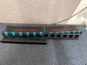 lot 36 image: Better Leader Fishing Pole Organizer