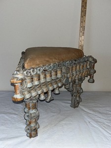 lot 61U image: Antique Triangular Wood and Upholstered Stool with Ornate Spool Turned Details