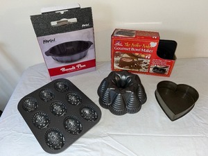 lot 81U image: Collection of 4 Baking Pans Bundt Parini Egg Mold Heart Pan Bowl Maker