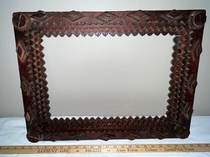 lot 157U image: Antique Adirondack-Style Tramp Art Wood Picture Frame 22x16 in