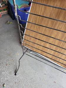 lot 135G image: Vintage Metal Storage Rack with Wire Design