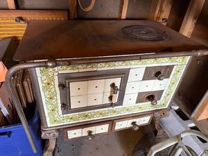 lot 26G image: Vintage Cream and Green Tiled Parlor Wood-Burning Stove with Floral Tile Design