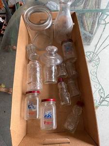 lot 60G image: Vintage Hazel Atlas Dutch Boy Glass Shakers, Bo Bo the Clown Bottles, and Bottle Collection with Unique Designs