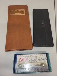 lot 55H image: Vintage War Bond Wallet, Technical Drafting Set, and ABC New Multi-Purpose Ruler Collection