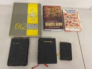 lot 24BC image: Vintage Book Lot Holy Bibles, Dakota Dawn, Geronimo Campaign, Yearbook & More