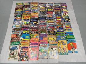 lot 26K image: Large Collection of Vintage Comic Books Featuring Marvel, DC, and Classic Cartoons