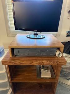 lot 110 image: Samsung Monitor with Magnavox DVD VCR Combo and Rolling Wood Cart