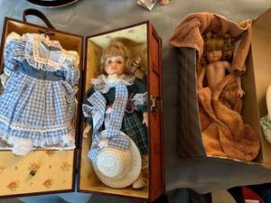 lot 145 image: Porcelain Doll with Wood Carrying Case and Two Outfits