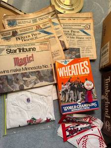 lot 146 image: Minnesota Twins 1987 World Series Memorabilia Lot with Newspapers, Wheaties Box, Shirt, and Collectibles