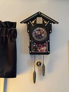 lot 162 image: Elvis Presley Wall Cuckoo Clock with Decorative Pinecone Weights