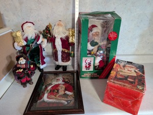 lot 253 image: Santa Claus Figurine Collection with Framed Santa Art and Animated Holiday Scenes
