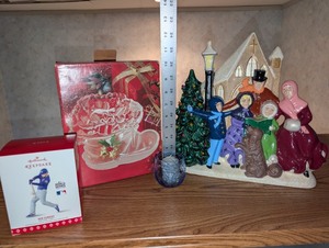 lot 282 image: Christmas Decor Lot Hallmark Ben Zobrist Ornament, Mikasa Santas Goodies Server, Carolers Figurine, and Blue Votive Holder