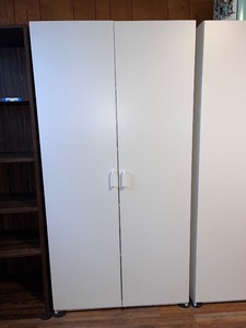 lot 194 image: White Two-Door Storage Cabinet, 72 in. Tall x 36 in. Wide