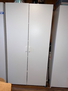 lot 195 image: White Two-Door Storage Cabinet, 72 in. Tall x 36 in. Wide