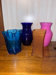 lot 200 image: Set of 4 Colored Glass Vases Assorted Shapes and Sizes