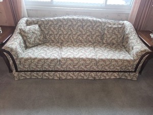 lot 52 image: Upholstered Floral Sofa with Wood Trim