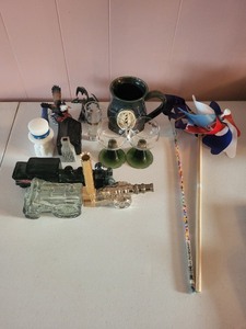 lot 65 image: Collection of 5 Vintage Avon After Shave Bottles Locomotive Cannon Cabin Uncle Sam