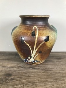 lot 219 image: Hand Made Pottery Vase with Unique Design on the Side