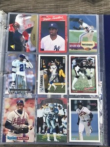 lot 231 image: Binder Full of Baseball & Football Cards - Steve McNair - Dan Marino - Emmitt Smith - Deion Sanders - Tim Brown - Rashaan Salaam