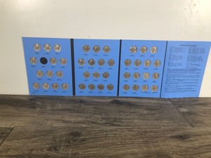 lot 300 image: Lot of 42 Washington Quarters in Book with Dates Ranging from 1965 to 1988