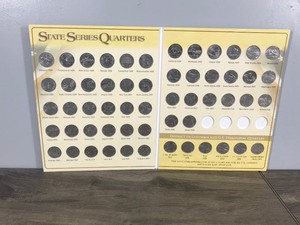 lot 305 image: Book of 1999-2009 State Series Quarters with District of Columbia & US Territorial Quarters - 56 Total