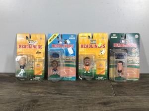lot 163 image: 1996 & 1998 Football & Baseball Corinthian Headliner Figurines - Roberto Alomar - Reggie White - Kenny Lefton - Kevin Greene