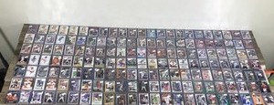 lot 106 image: Lot of Collectible Sports Cards - Basketball  Football  Baseball Hockey and More - All of them are in Top Loader Sleeves