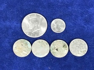 lot 94 image: Lot of Collectible Coins - 1935 Buffalo Head Nickel - 1899 V Nickel - 2000 P Kennedy Half Dollar - 2002 D Roosevelt Dime - 1941 Jefferson Nickel - 1930 Canadian Nickel