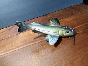 lot 72 image: Fishing spearing Signed catfish wood decoy with metal fins
